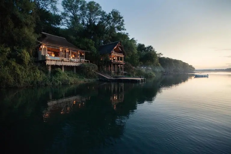 The luxurious Tongabezi Lodge is situated on the banks of the Zambezi River.