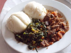 Beef seswaa, bogobe (pap), and morogo; a delicious local meal