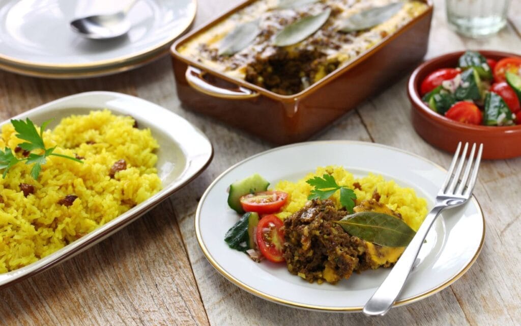 Bobotie and yellow rice | Photo: bonchan via Getty