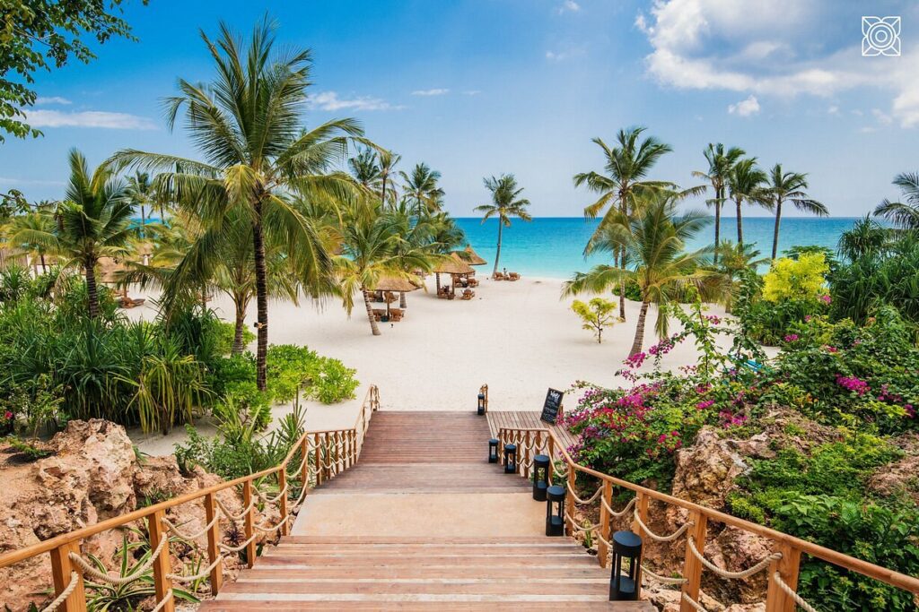 Wooden walkway to the tropical beach at Zuri Zanzibar | Photo credit: Zuri Zanzibar