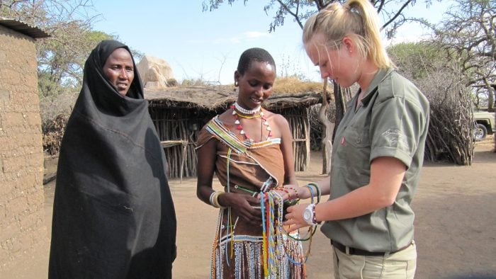 Jennifer Denton, a safari guide at Mwiba Lodge, with local village women in Tanzania | Photo credit: Jacada Travel