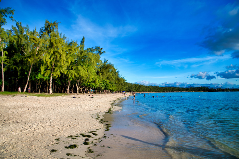 Big group of people enjoying the sun and sea at Mont Choisy