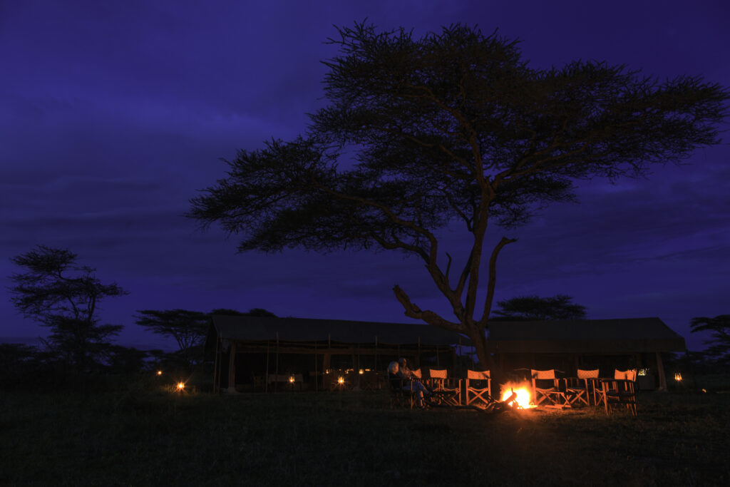 Nocturnal camp fire near the base encampment in the Serengeti Park.