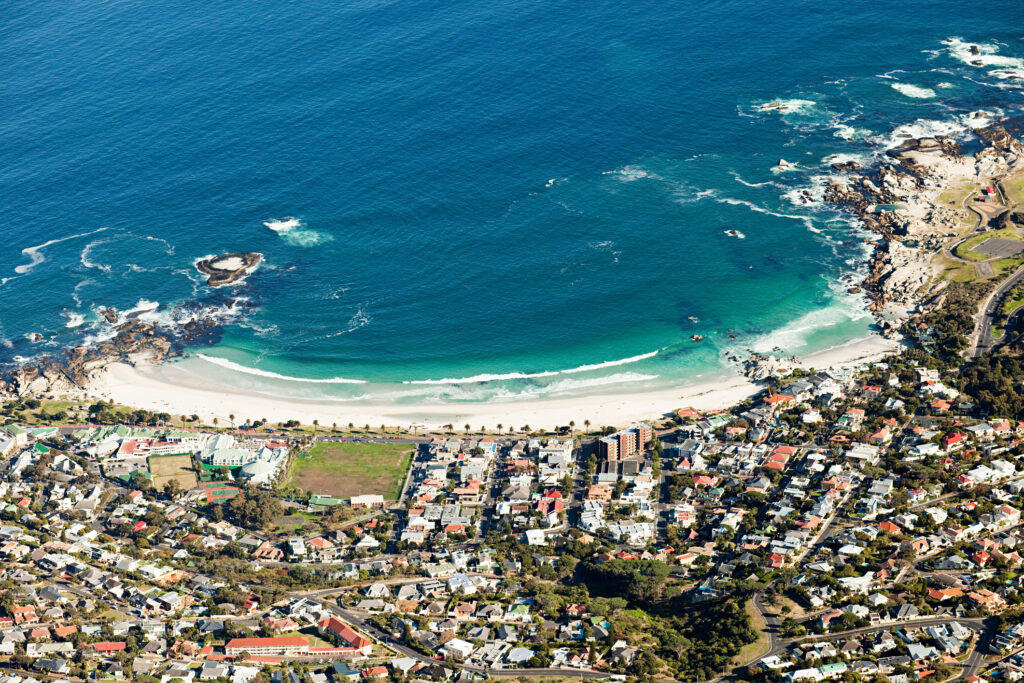 View down to beach of Camps Bay from top of Table Mountain, Cape Town, South Africa