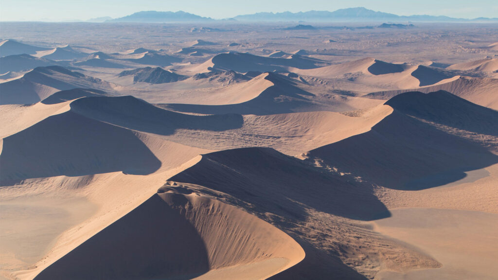 View of the Sossusvlei dunes from a helicopter safari, Namibia.